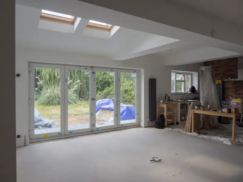 Bi-fold Doors in Whitley Bay Open-plan living space with wide glazed doors onto the garden, illustrating bi-fold doors for homes in Whitley Bay