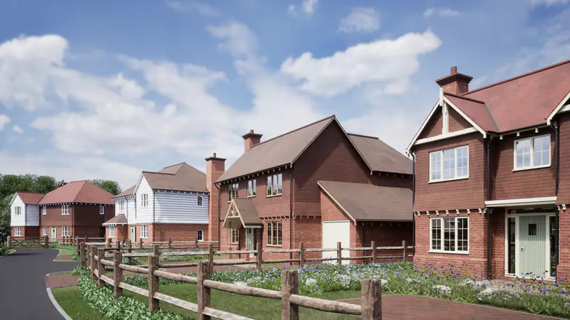 Windows and doors in Cramlington Modern red-brick detached house with a timber fence, illustrating windows and doors for homes in Cramlington