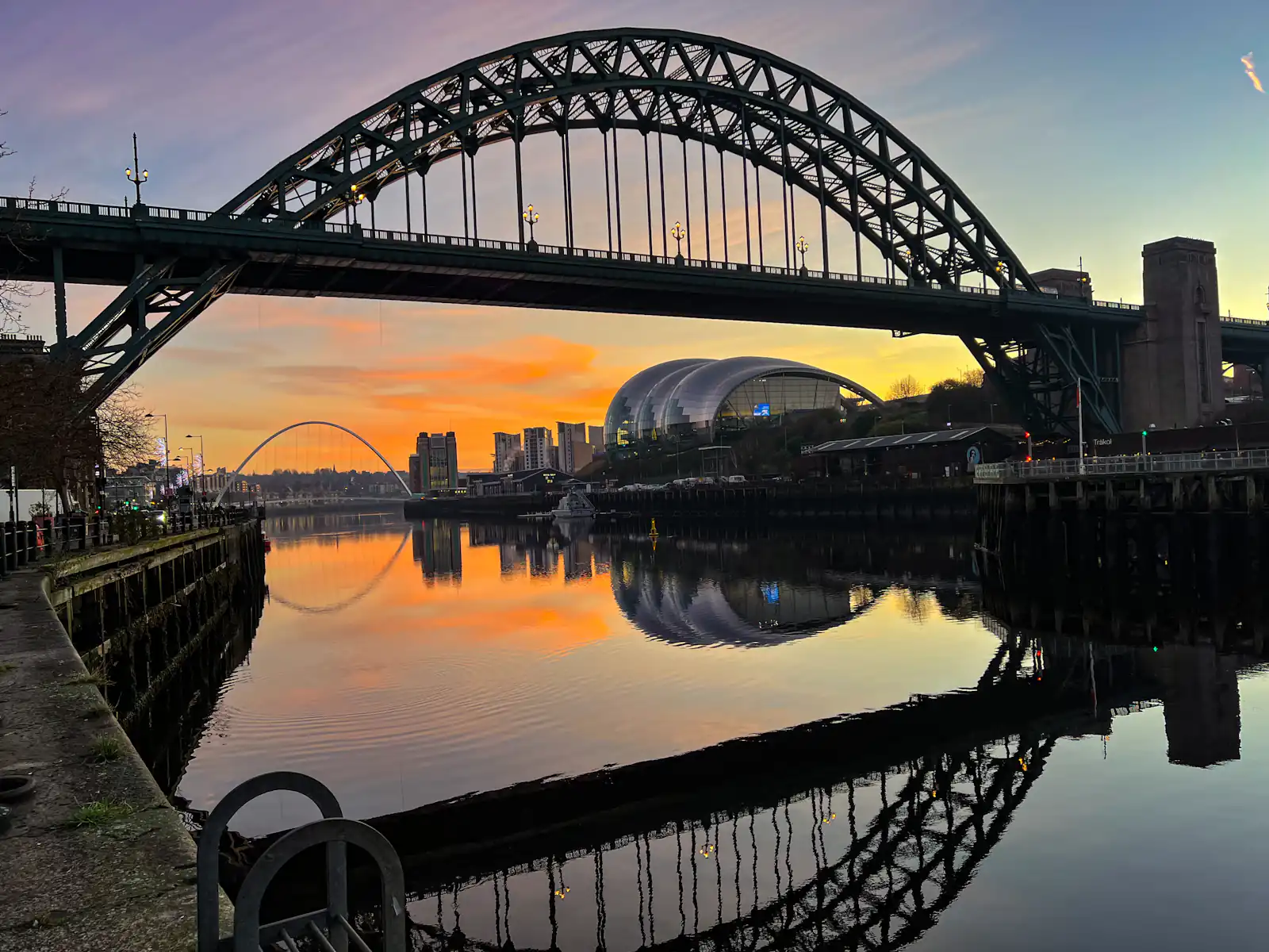 The Tyne Bridge and the Sage Gateshead at sunset
