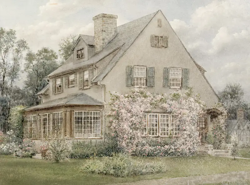 Windows and doors in Gosforth Stone house with bay windows behind a blossom tree, illustrating windows and doors for homes in Gosforth