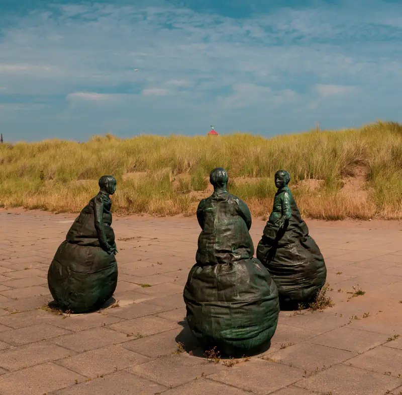 Windows and doors in South Shields The Conversation Piece bronze sculptures on the seafront, South Shields